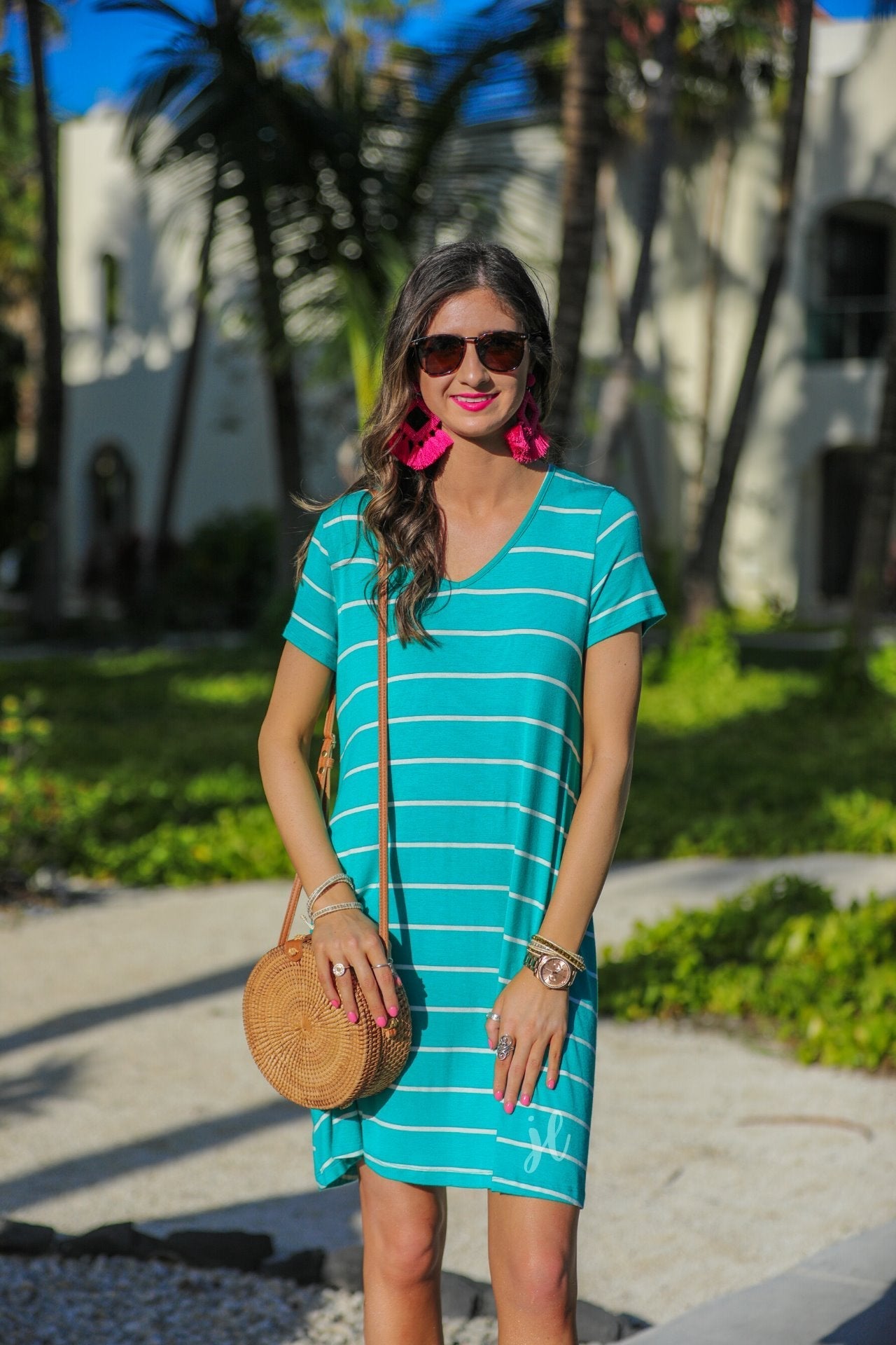 short-sleeve A-line dress with a V-neckline, crafted from ultra-soft fabric in a solid color with horizontal white stripes and a straight hemline in mint