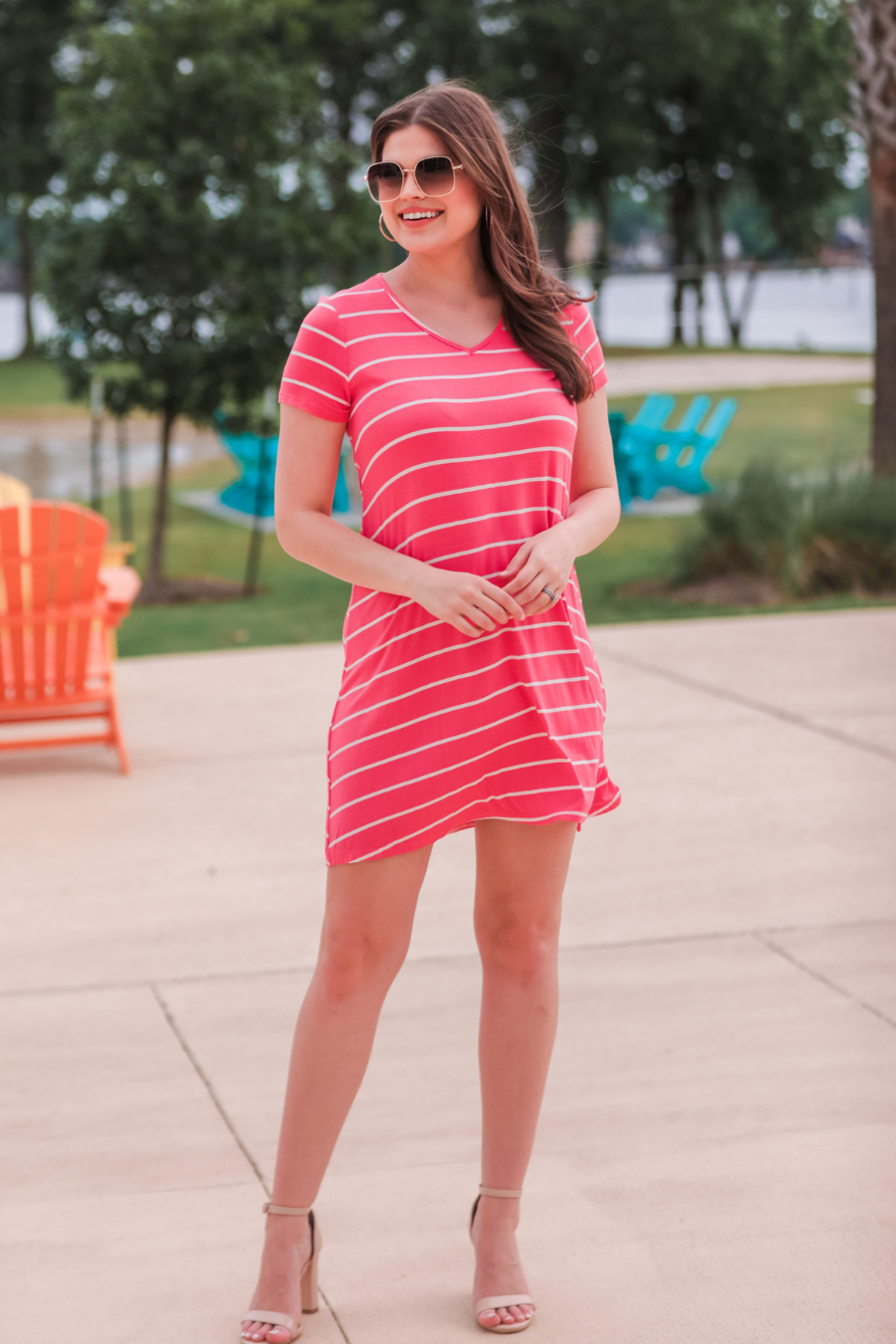 short-sleeve A-line dress with a V-neckline, crafted from ultra-soft fabric in a solid color with horizontal white stripes and a straight hemline in salmon