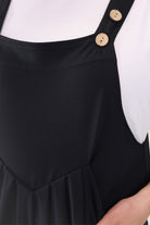 solid black overall shorts made from our best-selling everyday fabric with functional button straps, cuffed hems, and side pockets