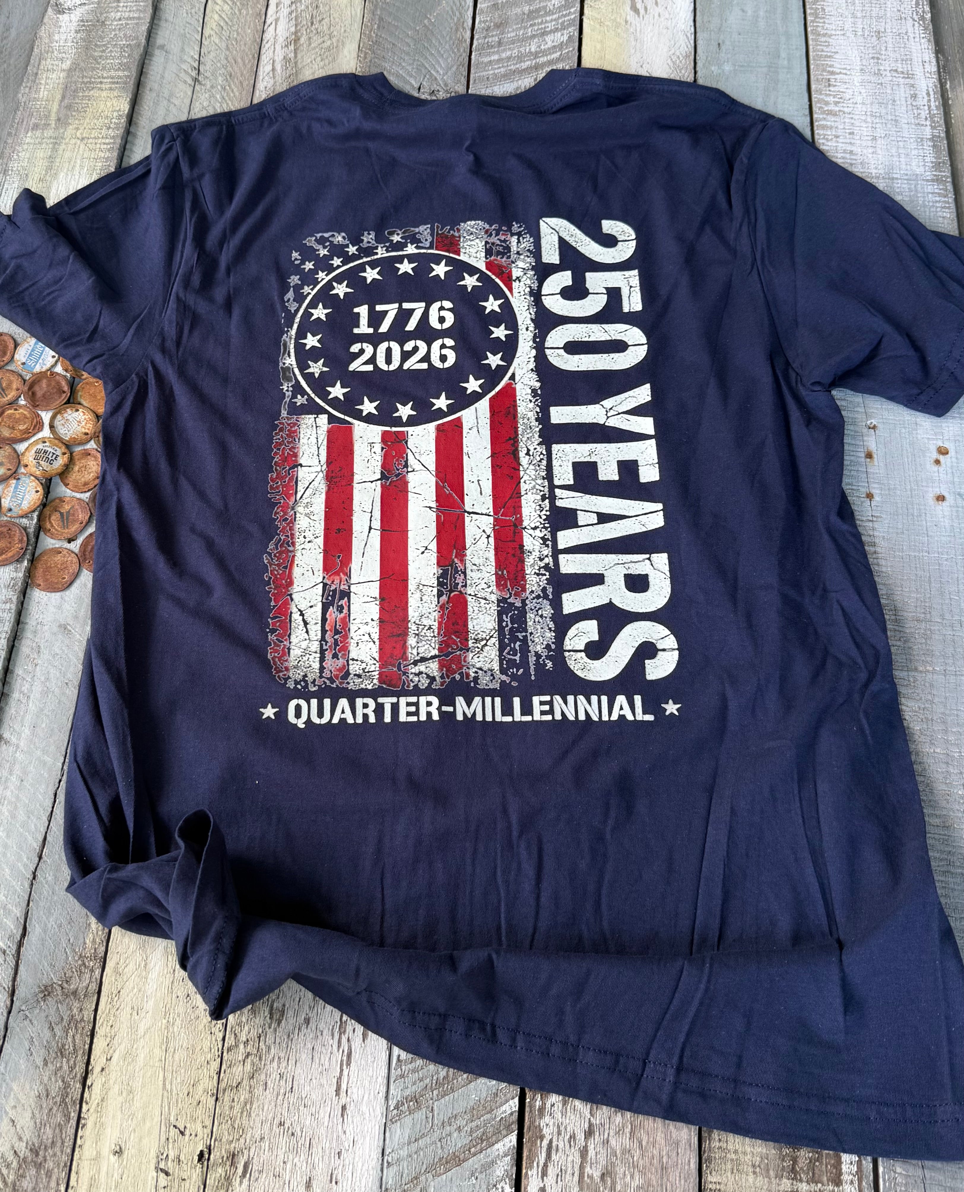 a soft navy unisex Gildan t-shirt with a crew neckline, short sleeves, a front 1776 / 2026 star circle graphic, a bold American flag and 250 YEARS Quarter-Millenial back design, and an easy year-round fit