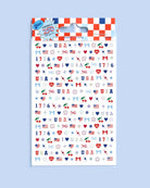 four complete sheets of peel-and-stick nail art with premium CMYK color, iridescent foil, and patriotic icons (bows, cherries, fireworks, flags, hearts, stars, and USA accents)