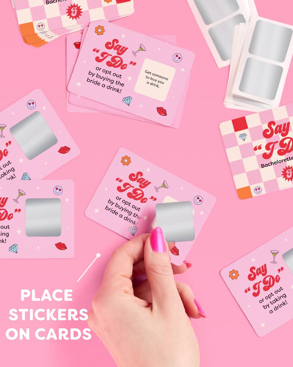 a 25-card bachelorette scratch-off dare card game with pink bridal designs, hidden silver panels, playful prompts, and a compact size for gifting, travel, favors, or GNO fun