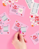 a 25-card bachelorette scratch-off dare card game with pink bridal designs, hidden silver panels, playful prompts, and a compact size for gifting, travel, favors, or GNO fun