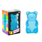 a blue jumbo gummy bear squishes with a super soft slow-rising feel, and a bright translucent color