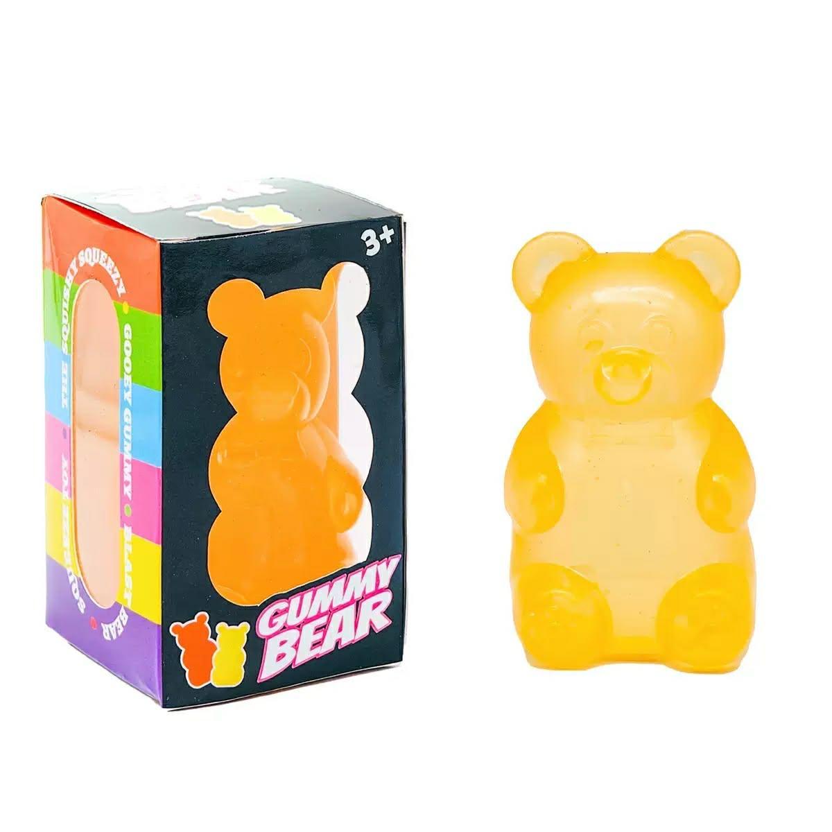 a yellow jumbo gummy bear squishes with a super soft slow-rising feel, and a bright translucent color