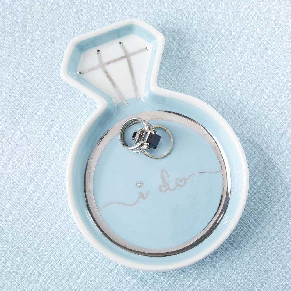 Ring dish shaped like an engagement ring with 'I do' text on a light blue background