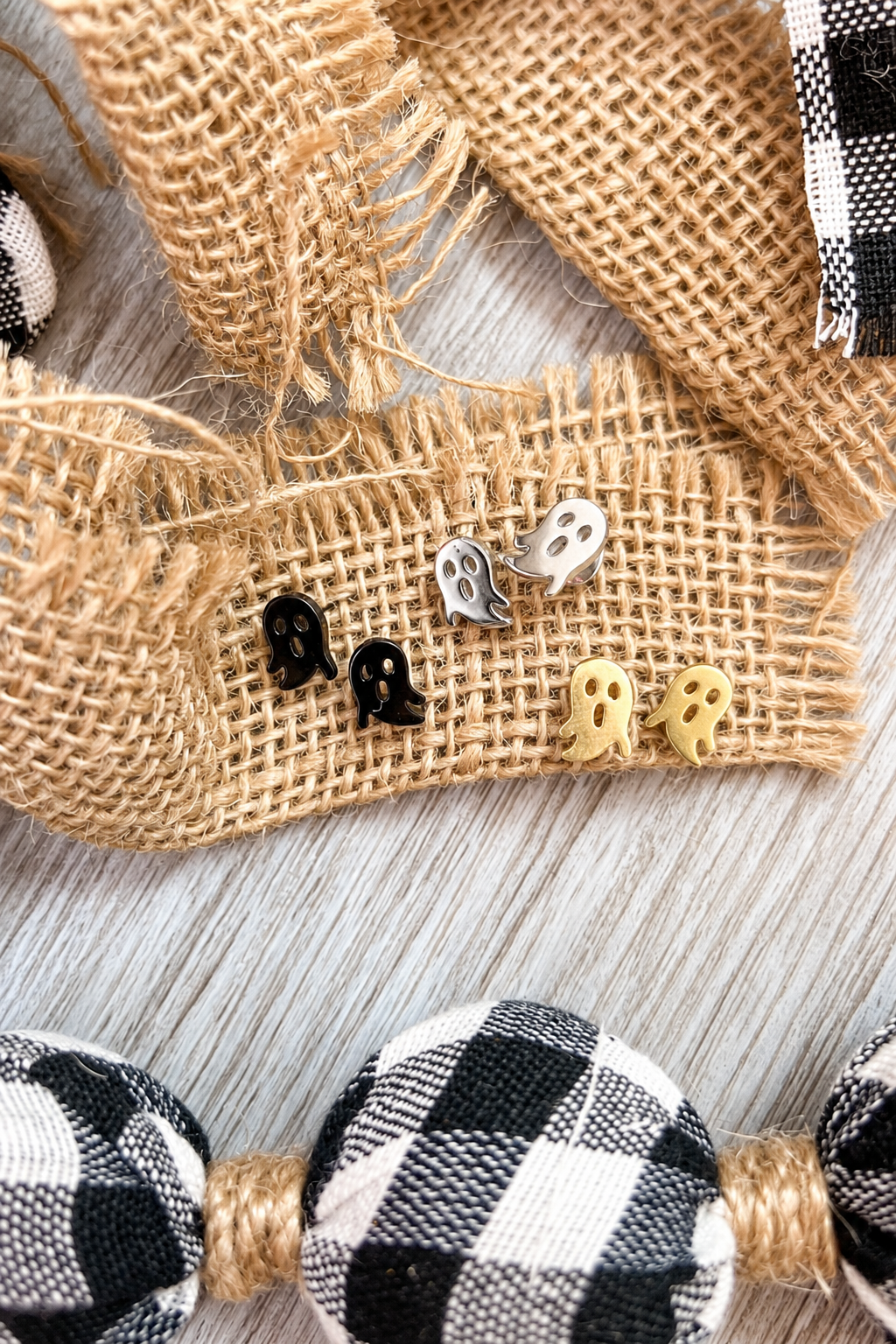 lightweight stainless steel, gold-plated post-stud earrings with shiny mirror-image ghost silhouettes, matching barrel earring backs, and nickel/lead compliant construction in black, gold, and silver