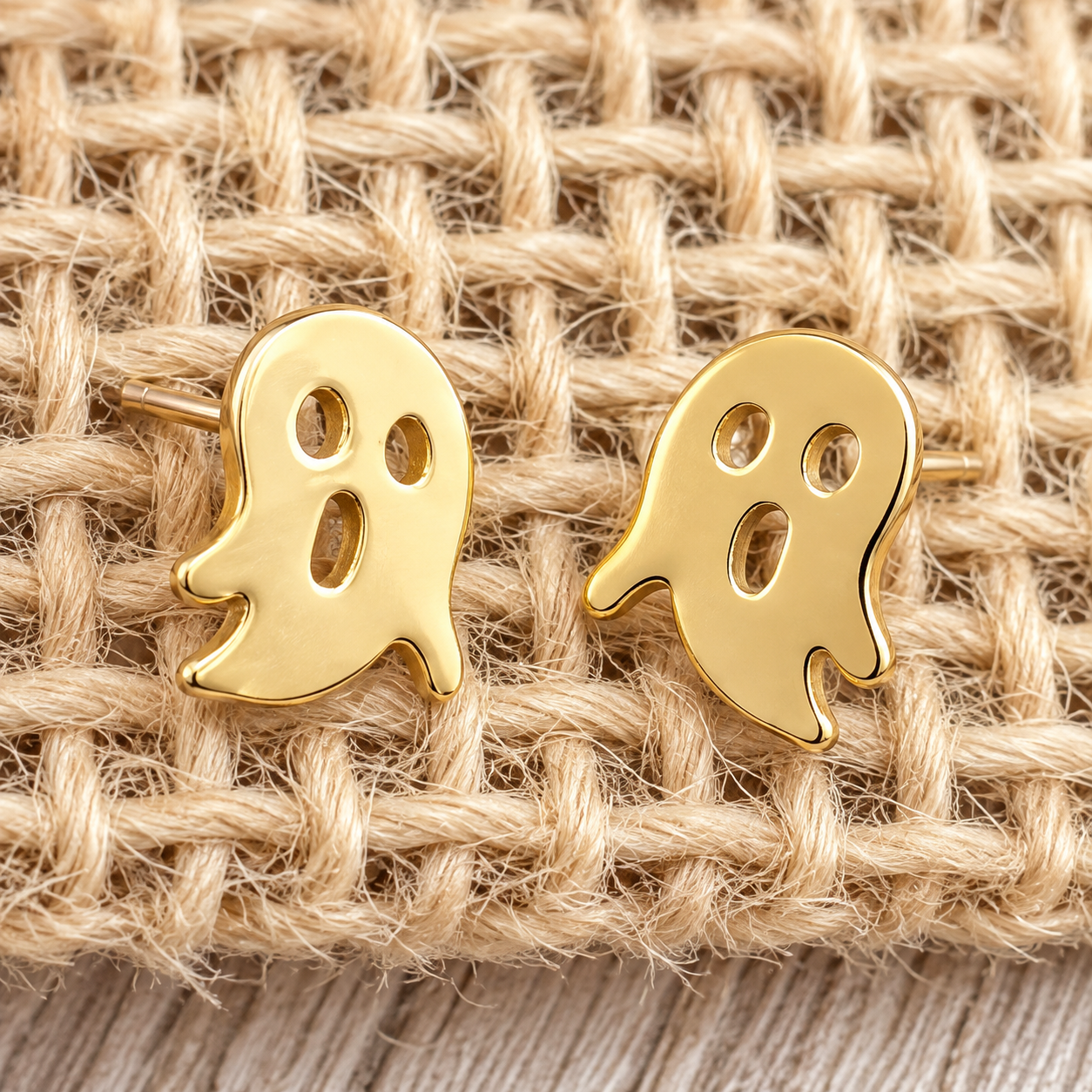 lightweight gold stainless steel, gold-plated post-stud earrings with shiny mirror-image ghost silhouettes, matching barrel earring backs, and nickel/lead compliant construction
