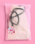 a roomy cream canvas tote with black embroidered 'Bride' script, black shoulder straps, and bow tie detail