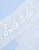 Card with 'bride to be' text on a light blue background