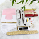 a practical and adorable red with soft pink watercolor wedding survival kit with items brides and bridesmaids need to ensure the wedding day goes smoothly