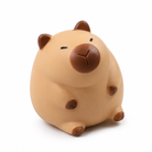 a capybara-inspired squishy toy with a rounded tan body, brown accent details, sleepy face, and smooth squeezable texture