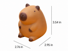 a capybara-inspired squishy toy with a rounded tan body, brown accent details, sleepy face, smooth squeezable texture , and size measurements