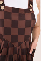 brown checkered overall shorts made from our best-selling everyday fabric with functional button straps, cuffed hems, and side pockets