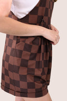 brown checkered overall shorts made from our best-selling everyday fabric with functional button straps, cuffed hems, and side pockets