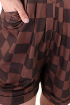 brown checkered overall shorts made from our best-selling everyday fabric with functional button straps, cuffed hems, and side pockets