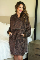 a blanket hoodie with roomy long sleeves finished with soft ribbed cuffs, a slouchy hood, drop shoulder, a kangaroo pouch on ultra plush fabric in Coco Leopard (Leopard)