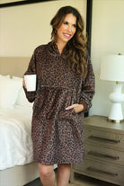 a blanket hoodie with roomy long sleeves finished with soft ribbed cuffs, a slouchy hood, drop shoulder, a kangaroo pouch on ultra plush fabric in Coco Leopard (Leopard)