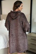 a blanket hoodie with roomy long sleeves finished with soft ribbed cuffs, a slouchy hood, drop shoulder, a kangaroo pouch on ultra plush fabric in Coco Leopard (Leopard)