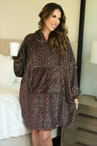 a blanket hoodie with roomy long sleeves finished with soft ribbed cuffs, a slouchy hood, drop shoulder, a kangaroo pouch on ultra plush fabric in Coco Leopard (Leopard)