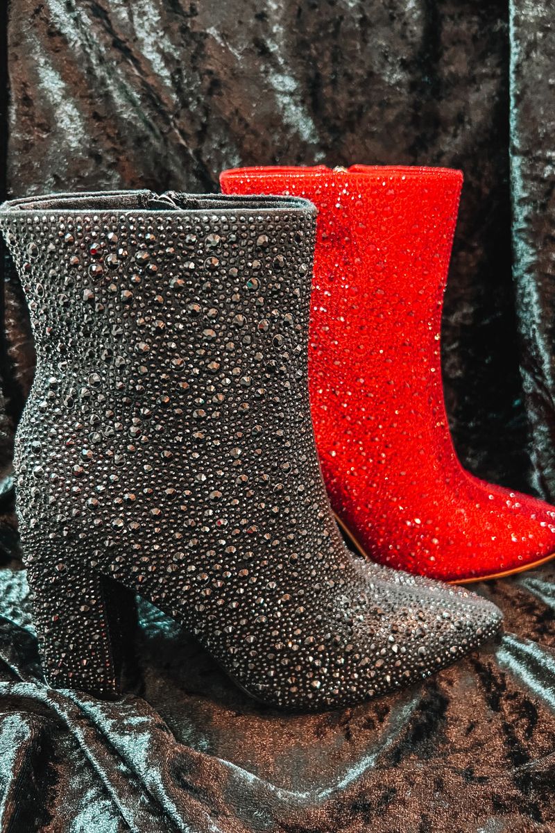 rhinestone-covered booties with a pointed toe, front seam, inside zipper, cushioned flatbed, and a 4" block heel in black and red