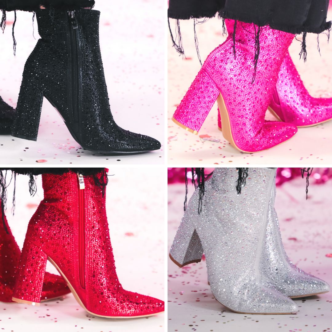 rhinestone-covered booties with a pointed toe, front seam, inside zipper, cushioned flatbed, and a 4" block heel in black, pink, red, and silver