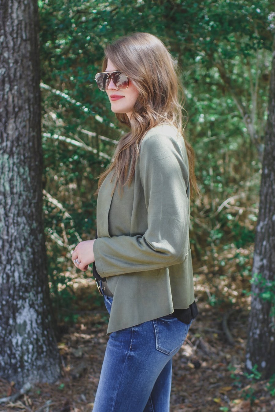 draped open-front silhouette jacket, crafted on a super soft faux suede material with long sleeves, an angled front cropped hem, and subtle seam details on the back in olive