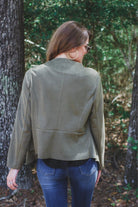 draped open-front silhouette jacket, crafted on a super soft faux suede material with long sleeves, an angled front cropped hem, and subtle seam details on the back in olive