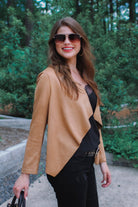 draped open-front silhouette jacket, crafted on a super soft faux suede material with long sleeves, an angled front cropped hem, and subtle seam details on the back in camel