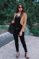 draped open-front silhouette jacket, crafted on a super soft faux suede material with long sleeves, an angled front cropped hem, and subtle seam details on the back in camel