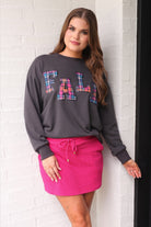 long-sleeve gray pullover with plaid 'FALL' letters in our exclusive Patterned In Plaid print, each outlined in sequins on a soft, cozy fabric