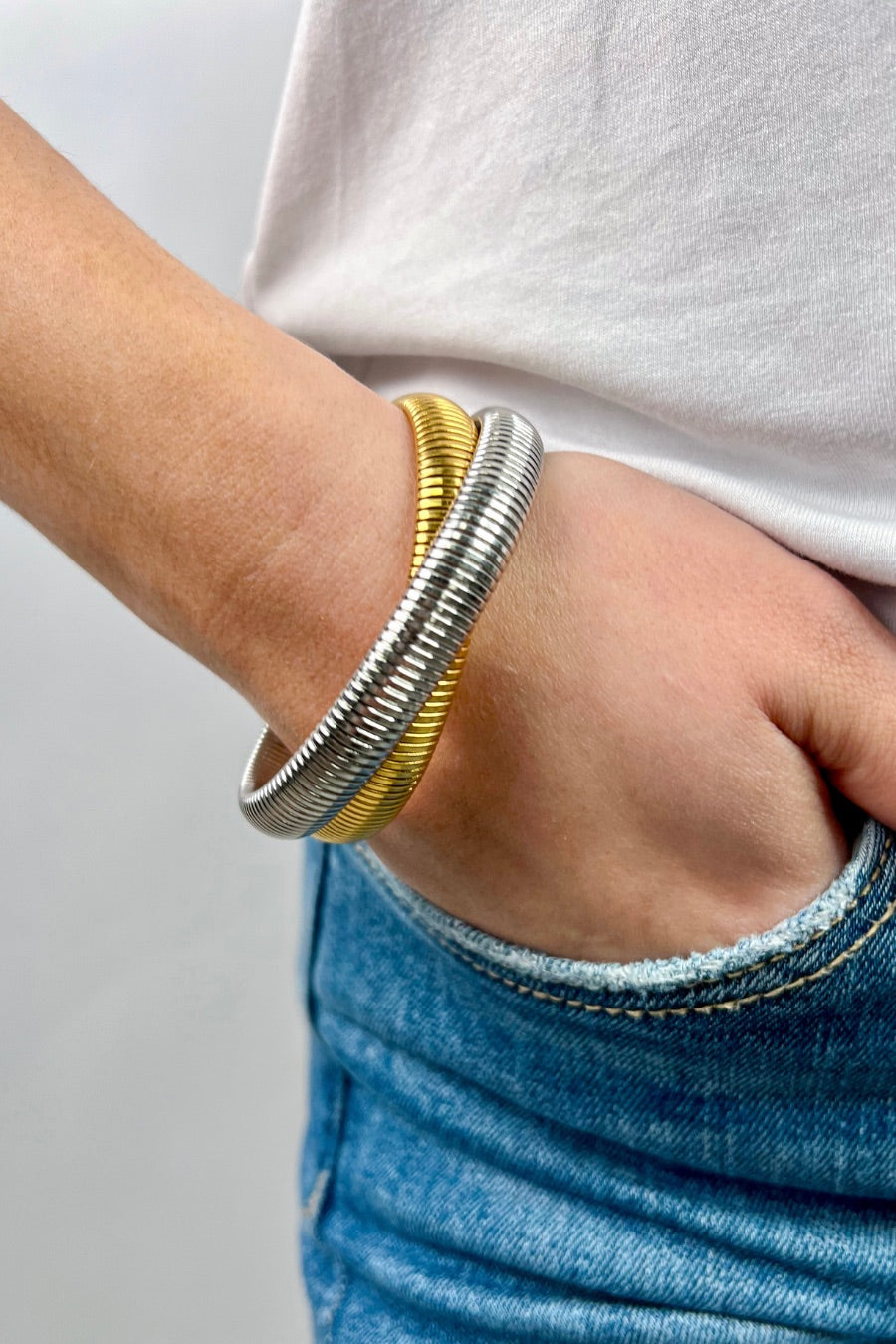 mixed metal bangle of gold & silver intertwined