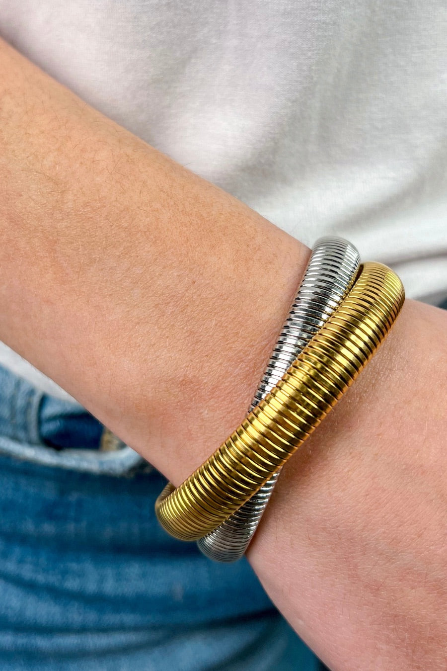 mixed metal bangle of gold & silver intertwined