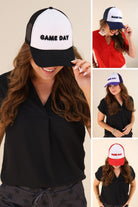 lightweight two-tone trucker hats with raised embroidered 'GAME DAY' lettering, tall foam front panel, breathable mesh back, snapback closure, and a curved bill in black, navy, purple, and red