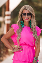 ruffled sleeve dress with layered pleats, an elastic waistband, and a lined bottom in pink