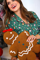 brown gingerbread girl fluffy pillow with dainty white icing details, stitched forest green buttons, and an adorable red bow paired with All I Want For Christmas Ruffle Pajama Set
