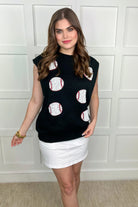 a black sleeveless sweater vest with an oversized fit, an allover textured baseball motif, and ribbed trim at the neckline, arm openings, and hem