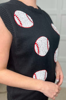 a black sleeveless sweater vest with an oversized fit, an allover textured baseball motif, and ribbed trim at the neckline, arm openings, and hem