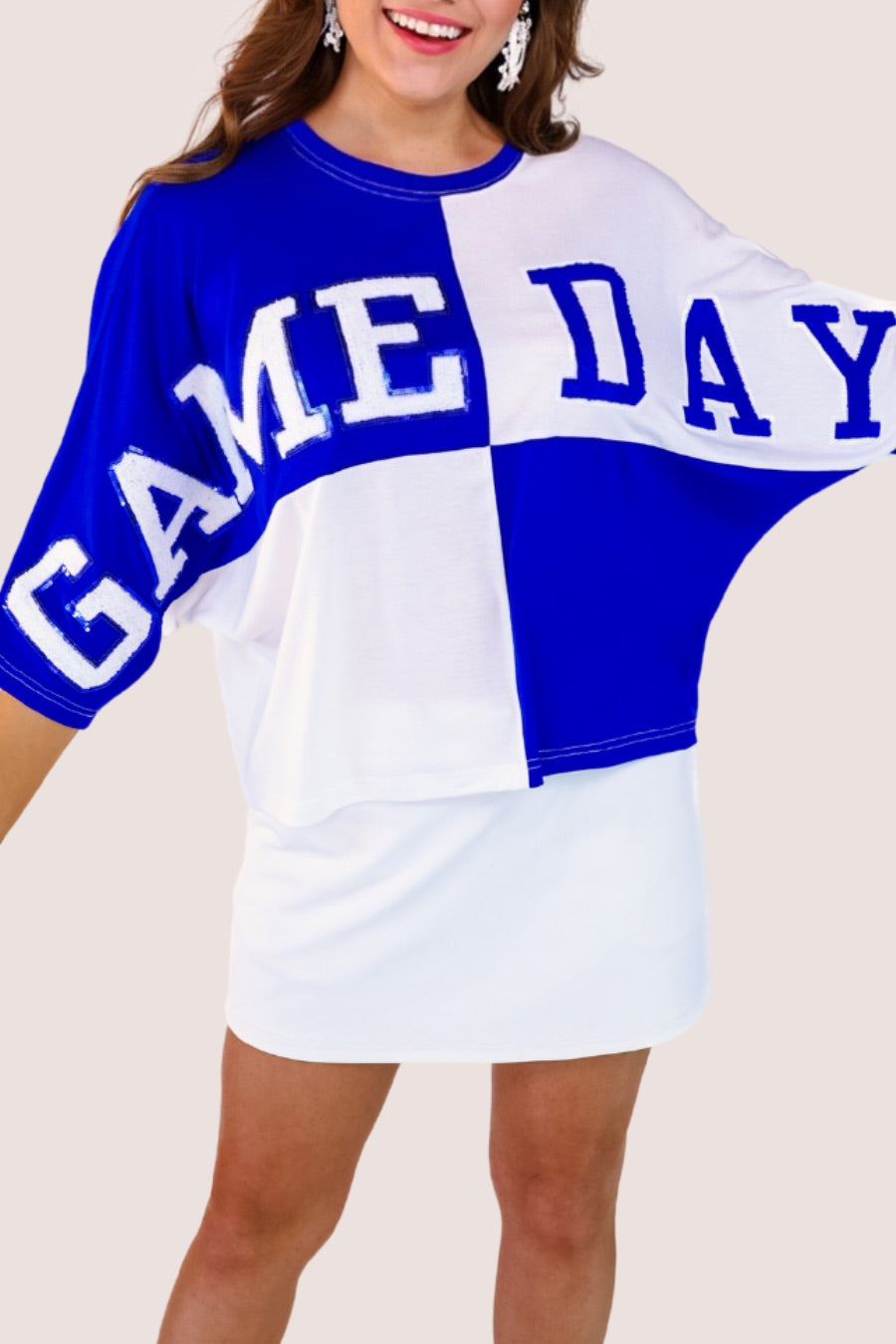short-sleeve color block mom crop top with oversized chenille 'GAME DAY' lettering outlined in sequins, where GAME pops with a coordinating color outline to match the color block style, while DAY stands out with a crisp white outline in blue