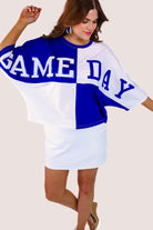 short-sleeve color block mom crop top with oversized chenille 'GAME DAY' lettering outlined in sequins, where GAME pops with a coordinating color outline to match the color block style, while DAY stands out with a crisp white outline in blue