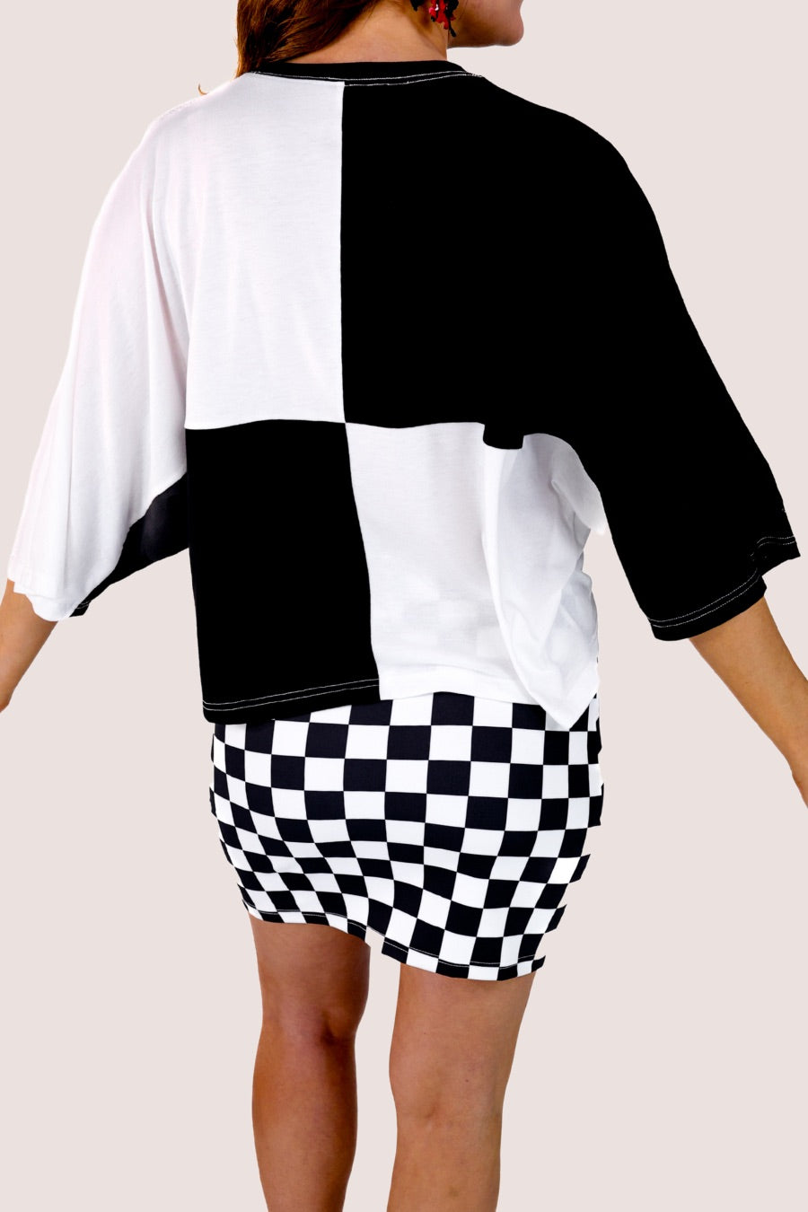 short-sleeve color block mom crop top with oversized chenille 'GAME DAY' lettering outlined in sequins, where GAME pops with a coordinating color outline to match the color block style, while DAY stands out with a crisp white outline in black