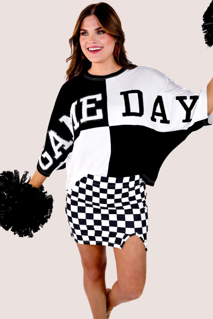 short-sleeve color block mom crop top with oversized chenille 'GAME DAY' lettering outlined in sequins, where GAME pops with a coordinating color outline to match the color block style, while DAY stands out with a crisp white outline in black