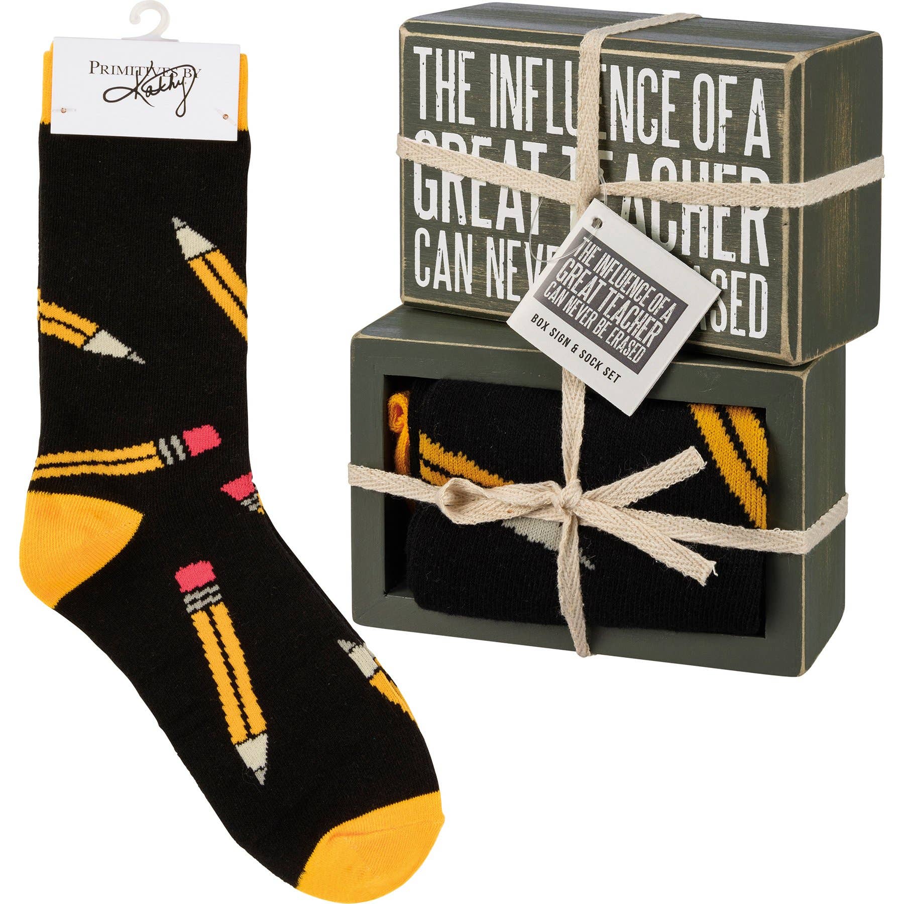 Black socks with yellow and pink accents and a decorative box with text.