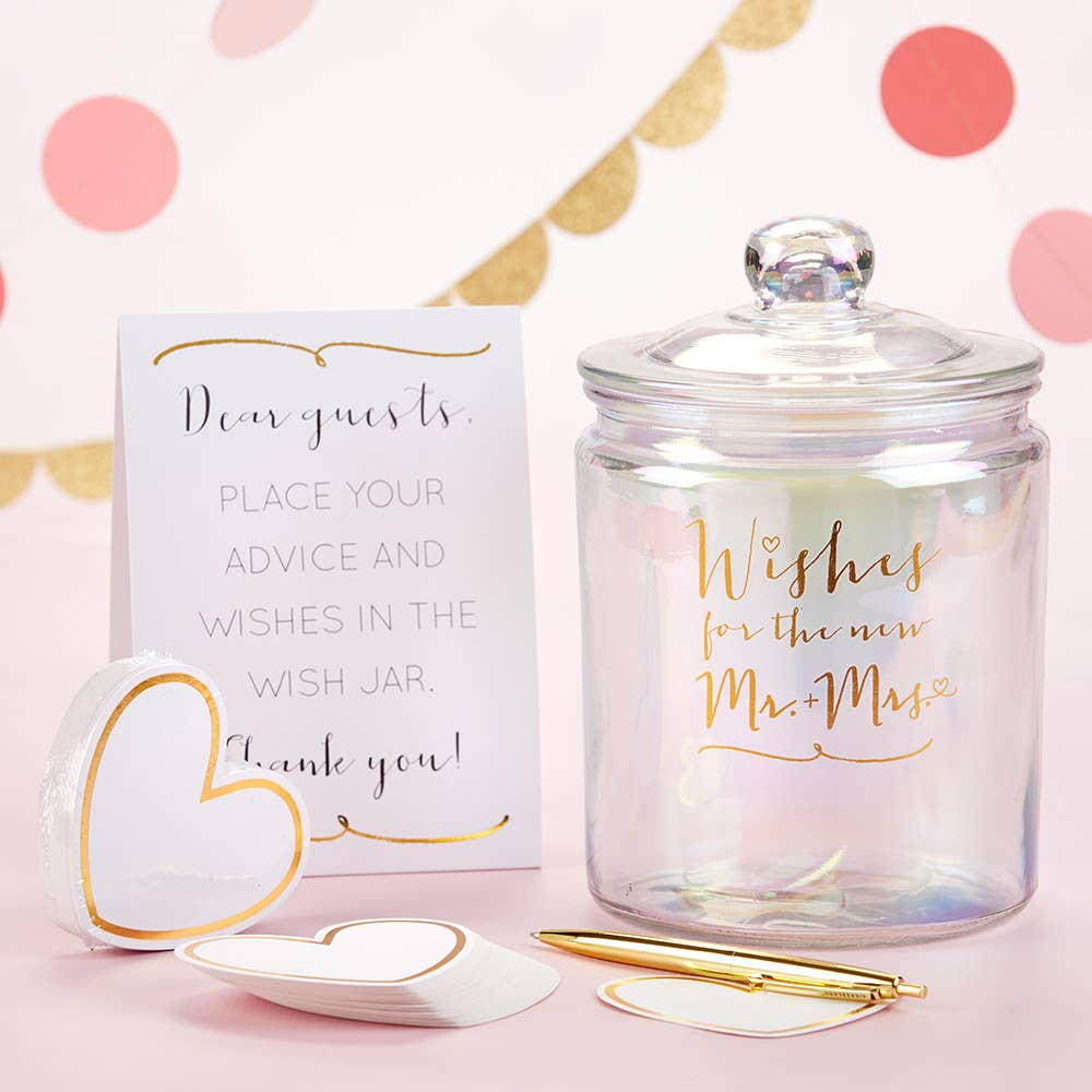 Wish jar with a card and heart-shaped paper on a pink background