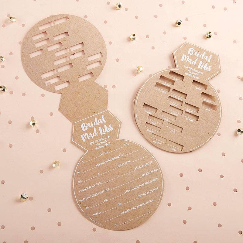 Bridal shower game cards shaped like a dress on a polka dot background