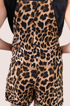 black and brown leopard pattern print overall shorts made from our best-selling everyday fabric with functional button straps, cuffed hems, and side pockets
