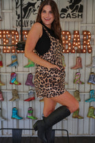 black and brown leopard pattern print overall shorts made from our best-selling everyday fabric with functional button straps, cuffed hems, and side pockets