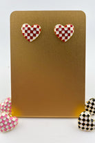 vibrant red heart-shaped stud with a comfort earring back in gold