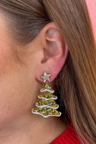 lightweight star stud earrings with a cascading Christmas tree adorned with vibrant green and multicolor pavé stones and glossy white enamel trim