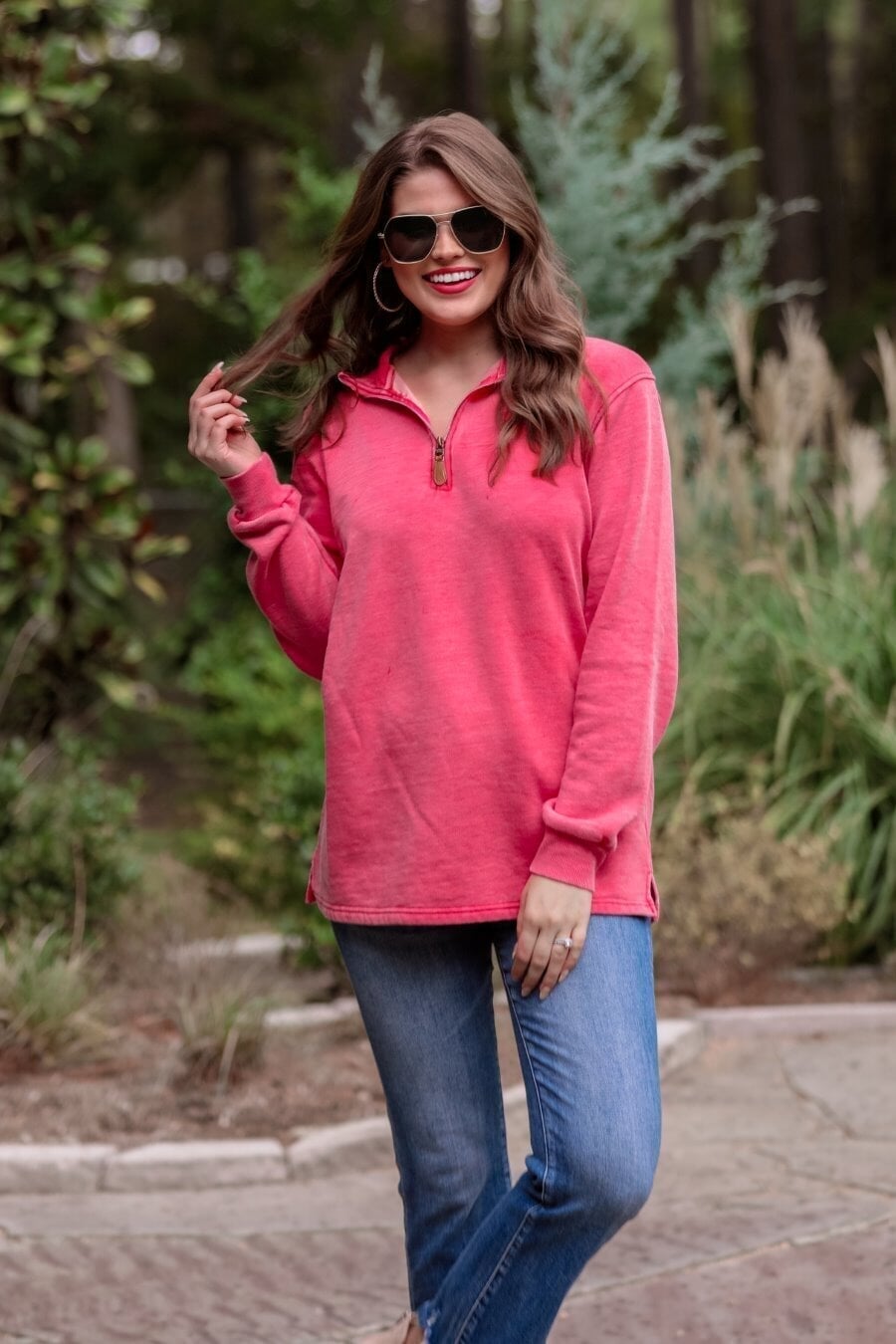 long sleeve pullover crafted from vintage wash fabric with a foldable collar, side slits, and a quarter zip in red